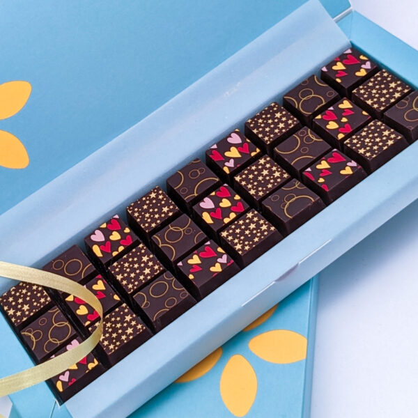 A Gift Box Of Solid Decorated Dark Chocolates - Image 4