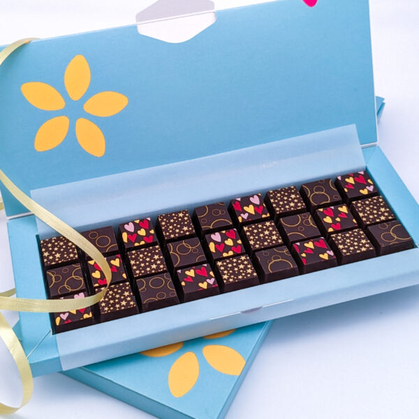 A Gift Box Of Solid Decorated Dark Chocolates - Image 2